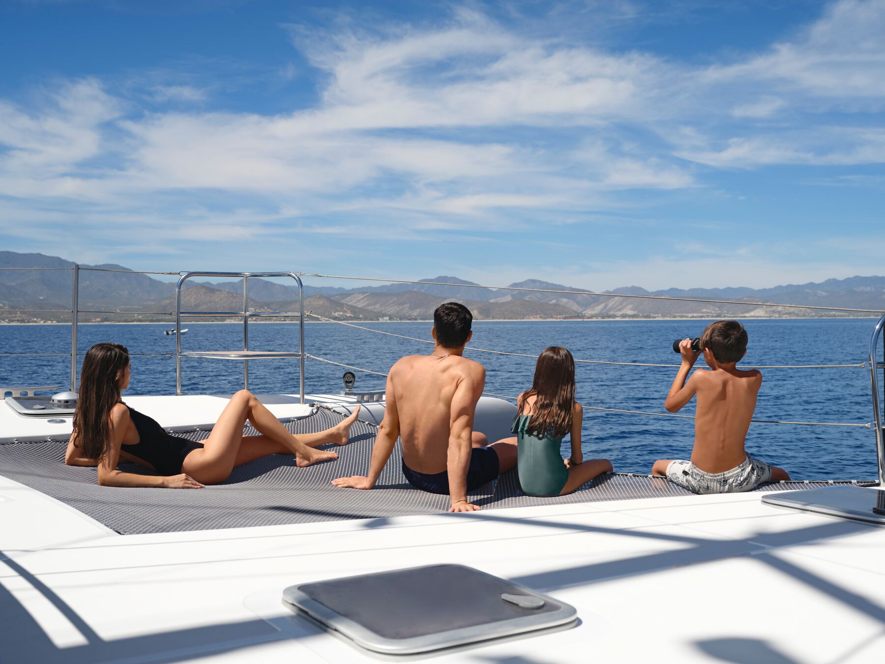 Family aboard a catamaran on the Sea of Cortez